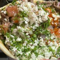 Beef Gyro · Romaine Lettuce, Tomato, Onion, Feta cheese, Chopped Parsley,  Tzatziki, Homemade garlic sau...
