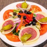 Antipasto Salad · Ham, salami, provolone, roasted peppers, olives, red onion, tomato, artichoke hearts, pepper...