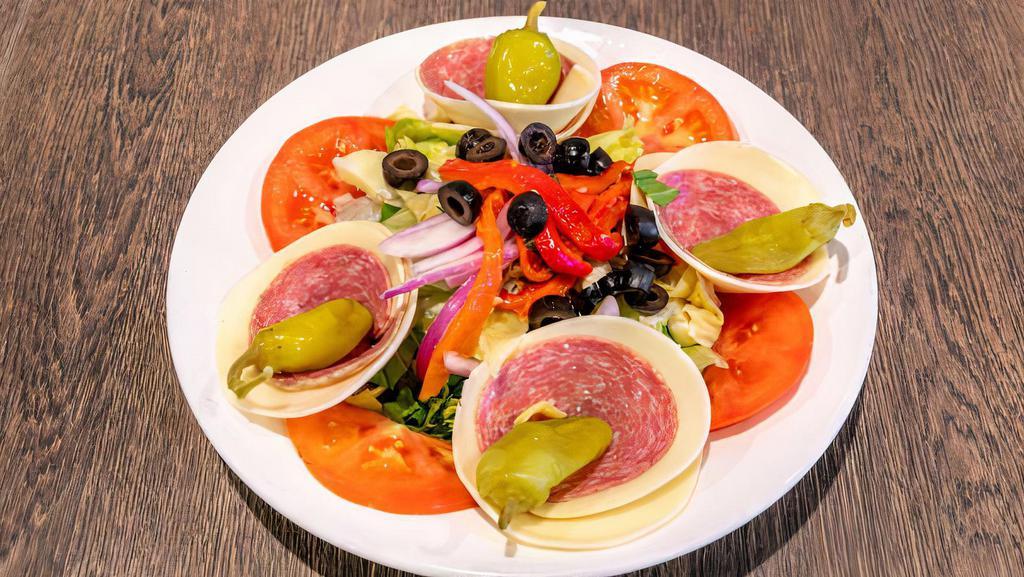 Antipasto Salad · Ham, salami, provolone, roasted peppers, olives, red onion, tomato, artichoke hearts, pepperoncini, shaved Parmesan, balsamic glaze.