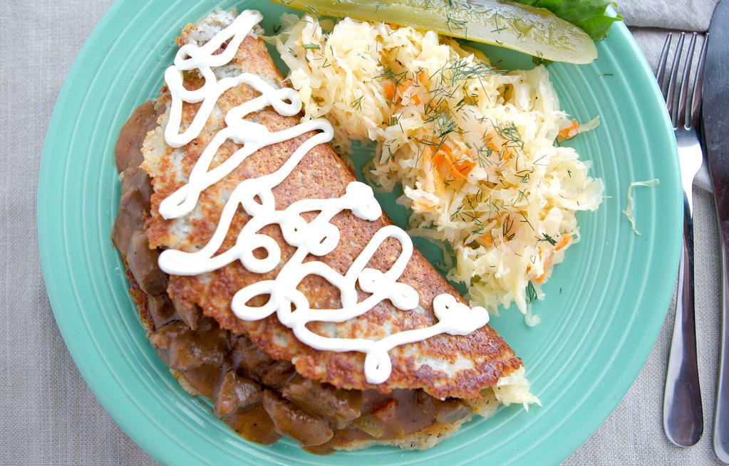 Beef Stew With Potato Pancake · Topped with sour cream, served with 1 side