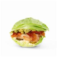 Cali Chicken Lettuce Wrap · Grilled chicken, house-made guac, hardwood-smoked bacon, Provolone, pickles, lettuce, tomato...