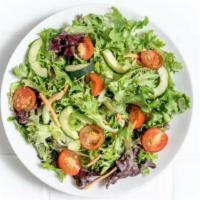 Field Greens Salad · Cherry tomatoes, carrots, cucumbers, and roasted tomato vinaigrette.