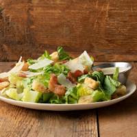 Side Bacon Caesar Salad · Crisp romaine topped with house-made croutons, applewood smoked bacon, shaved parmesan, and ...