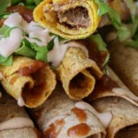 10 Rolled Tacos - Regular Price · 10 beef deep fried Rolled Tacos 
Topped with cheese 
Sour cream
Lettuce 
Guacamole 
Pico de ...