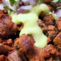 Adobada / Al Pastor Taco - Regular Price · High quality pork shoulder marinaded in achiote seasoning
Hand made style corn tortilla
Guac...
