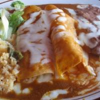 2 Enchilada Combo · 2 chicken enchiladas (red) topped with mozzarella cheese, sour cream, cilantro and onions. s...