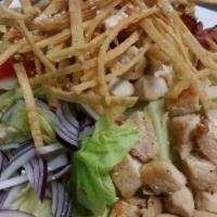 Chopped Salad · Grilled chicken dices over a bed of lettuce, tomatoes, crispy bacon, cheese, and onion toppe...