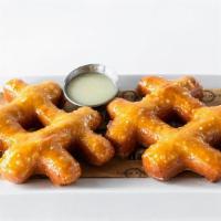 Hot Glazed Donuts · Two hashtag shaped donuts / warm sugar glaze.