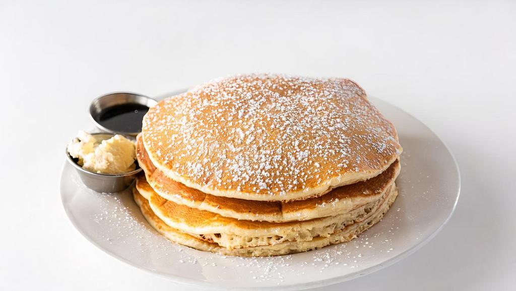 Buttermilk Pancake · Vanilla cream and warm maple reduction.