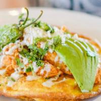 Chicken Tinga Frittata · Chipotle-braised chicken breast, caramelized onions, blistered shishito peppers, queso fresc...