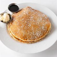 Kids Short Stack Pancakes · Buttermilk or chocolate chips pancake, warm maple reduction, choice of hash potatoes, French...