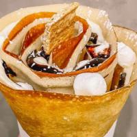 S’Mores Crepe · marshmallows, chocolate sauce, graham crumbs, whipped cream.