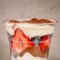 Berries Party Parfait · strawberry, blueberry, nutella, whipped cream, vanilla ice cream.