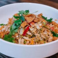 Thai Peanut Salad · Napa cabbage, julienne red bell peppers, celery, fresh cilantro, crushed peanuts, crispy won...