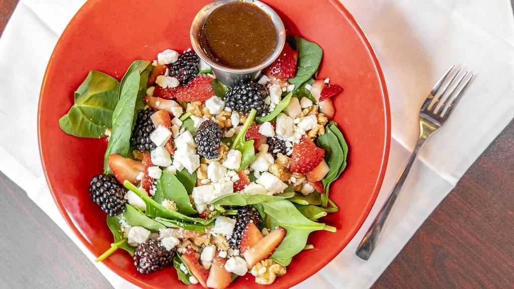 Spinach & Fruit · Spinach, fresh fruit (seasonal), feta cheese, and walnuts.