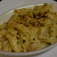 Lobster Mac & Cheese · White cheddar cheese, lobster, campenelle pasta, bread crumbs.