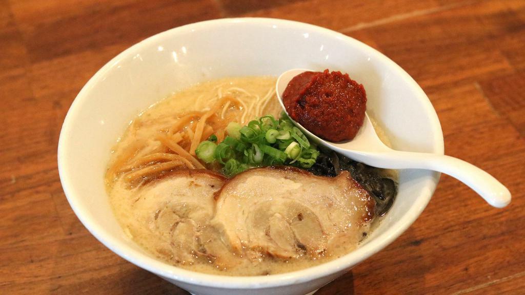 Spicy Tonkotsu Ramen · Pork broth, spicy sauce and thin noodles.