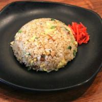 Fried Rice · Onions, green onions, egg, chopped chashu pork with rice.