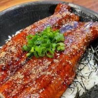 Unagi Bowl · Broiled BBQ eel over steamed white rice with green onion and pickles