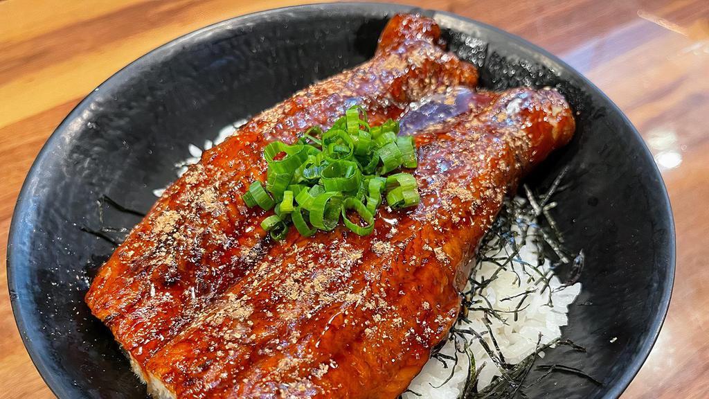 Unagi Bowl · Broiled BBQ eel over steamed white rice with green onion and pickles