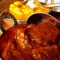 Chicken Vindaloo · (GF)Chicken cooked in a hot spicy sauce with potatoes