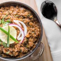 Punjabi Chole · Garbanzo beans cooked with tomatoes and special house spices
(Note: Please add Rice to your ...