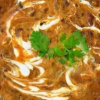 Dal Chicken Makhani · Gluten-free. Tender Chicken pieces and lentil simmer with butter and cream and delicately sp...