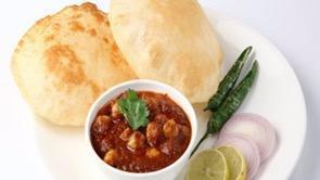 Chole Puri · A flour homemade fried tortilla goes with Chole (Garbanzo beans cooked with onion, tomatoes ...