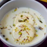 Rasmalai (2 Pieces) · Rasmalai is a popular Bengali sweet delicacy made with Indian cottage cheese or chenna (pane...