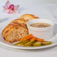 Chicken Liver Pate · Homemade liver pate with fresh baked baguette and pickles.