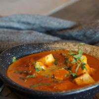 Paneer Butter Masala · Gluten free. Spicy. Cubed paneer, tomato, butter, cream, indian spices.