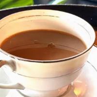 Burmese Tea. · Sweetened Burmese Black Assam Tea with milk. (Serves Hot or Iced). Dairy-Free option is avai...