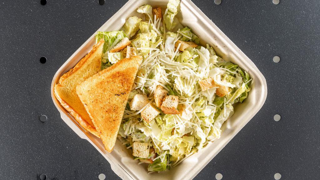Caesar Salad · Romaine, parmesan and homemade croutons tossed with caesar dressing.