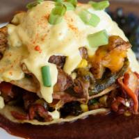 Baja Chicken Hash Stack · Fried tortilla layered with pulled chicken, roasted poblano Chiles, corn, potatoes, green on...
