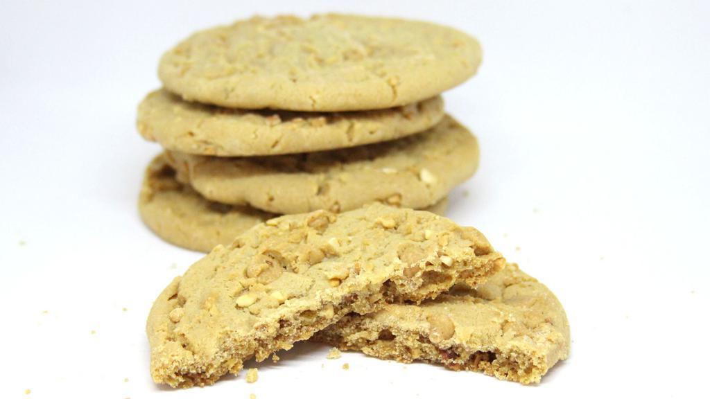 Peanut Butter Cookie · A combination of chunky peanut butter, peanut butter chips and diced peanuts, this cookie is a peanut lovers fantasy! Finished with the “criss-cross” mark shows that this cookie is made by hand.
