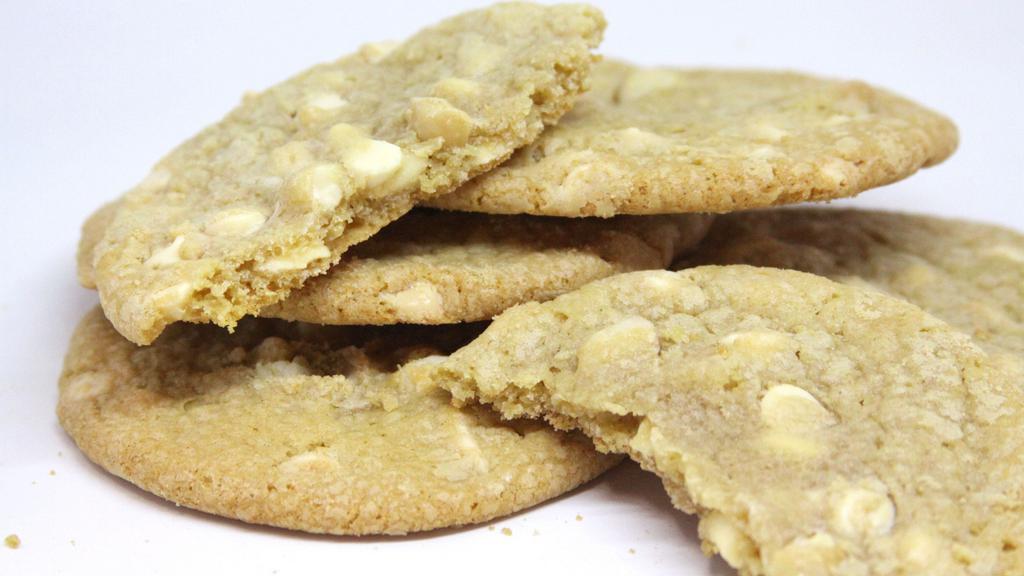 White Chocolate With Macadamia Nut Cookie · Rich and creamy premium white chocolate chips from the famous Guittard Chocolate Company, mixed with macadamia nut halves to make this gourmet cookie a special treat.