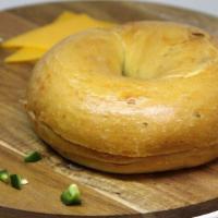 Jalapeño Cheddar Bagel · A premium bagel baked with freshly shredded natural cheddar and fresh jalapeno peppers ~ Jus...