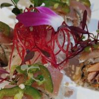 Trailblazer Roll* · Tempura salmon, spicy crab, and cucumber; topped with albacore, jalapeño, scallion, and garl...