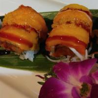 Mango Tango Roll* · Tempura shrimp and spicy tuna topped with mango, salmon, and sweet soy glaze, chili aioli, a...