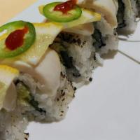 Butterfly Roll* · California roll topped with seared escolar, lemon, serrano pepper, and house spicy sauce.