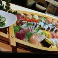 Sushi Boat B* · 4 rolls (spicy tuna, Oregon, spider, and rainbow), chef’s selection of 16pc nigiri sushi, an...