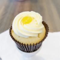 Lemon Drop Cupcake · Lemon filled cake with our lemon buttercream and a lemon dollop.