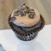 Choco-Holic Cupcake · Chocolate cake with chocolate buttercream topped with chocolate shavings.