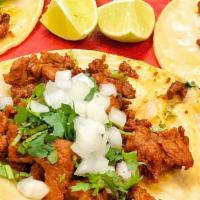 Pastor Taco (Pork) · Mayo, Beans, Onions & Cilantro