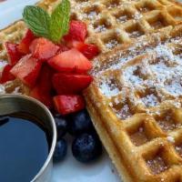 Waffles · Vegan and gluten-free waffles; powdered sugar, butter, maple syrup, with a choice of strawbe...