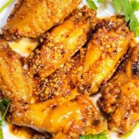 Spicy Chicken Wings / Cánh Gà · Sweet chili sauce.