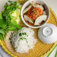 Hanoi Rice Vermicelli / Bún Chả Hà Nội · Grilled marinated pork, sausage & mints salad, pickles.