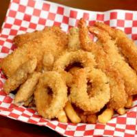 Seafood Combo · Two pieces fish, two pieces shrimps, two pieces oyster. And fries