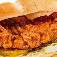 Nashville Hot Chicken Tender Sandwich (Halal) · with mayo, lettuce and pickle on bun. Include 1 side and 1 can soda