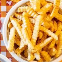 Organic Crinkle Cluckfries · American-Grown & Certified Organic Spuds topped with Super Secret CluckSeasoning! Served wit...
